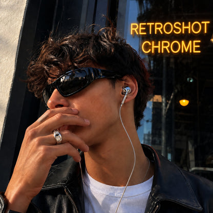 RetroShot Chrome silver earbuds, lifestyle editorial